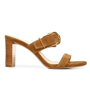 The Griddley mules from Veronica Beard are crafted of suede with buckle detail.